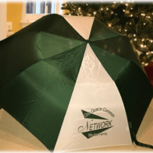 Green and white umbrella with company logo.
